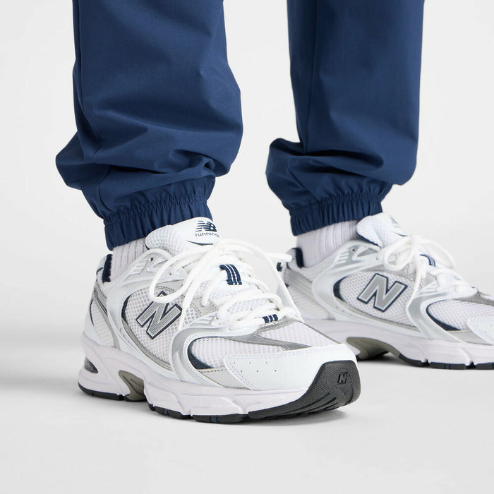 ニューバランスNEWBALANCEスポーツトレーニングウェアメンズロングパンツBukatsuウーブントラックジョガーパンツ裏メッシュ25FWAMP53170