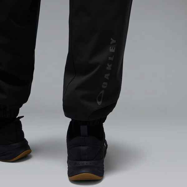 オークリーOAKLEYメンズブレーカーパンツ起毛メッシュ26FWEnhanceWindWarmPants16.7ロングパンツジャージFOA409523