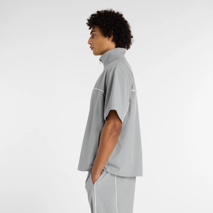 【ネコポス対応可】ニューバランスNEWBALANCEトレーニングシャツトレーニングジャケットメンズウーブンショートスリーブハーフジップMT61713I-YST