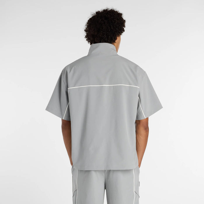 【ネコポス対応可】ニューバランスNEWBALANCEトレーニングシャツトレーニングジャケットメンズウーブンショートスリーブハーフジップMT61713I-YST