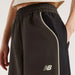 ニューバランスNewBalanceレディースブレーカーパンツトラックサイドウィーブンパンツ26FWWB62O9UF-BLK