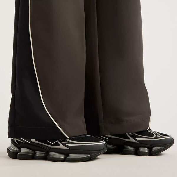 ニューバランスNewBalanceレディースブレーカーパンツトラックサイドウィーブンパンツ26FWWB62O9UF-BLK