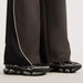 ニューバランスNewBalanceレディースブレーカーパンツトラックサイドウィーブンパンツ26FWWB62O9UF-BLK